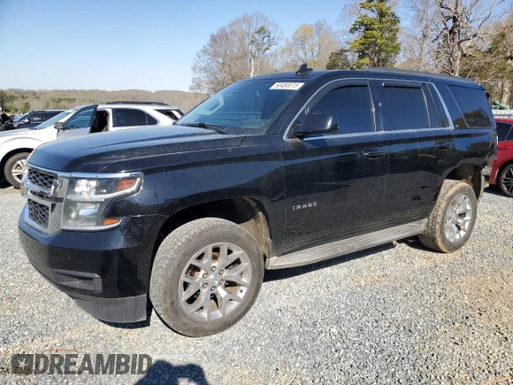 2015 Chevrolet Tahoe LT with VIN 1GNSCBKC0FR521749, listed as a Copart auction lot 50480075 with 156,940 mi miles and Salvage Title. Bid and sale history available at DreamBid. Image 1.