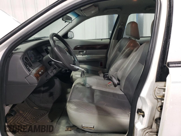 2005 Mercury Grand Marquis GS z VIN 2MEFM74W05X612471, wystawiony jako Copart lot #49455195 z przebiegiem 140 916 mil mil oraz Szkoda całkowita • Salvage title. Historia ofert i sprzedaży dostępna na DreamBid. Obrazek 7.