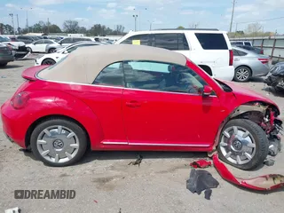 2015 Volkswagen Beetle 1.8T w/Tech with VIN 3VW517AT4FM803238, listed as a IAAI auction lot 41812373 with 42,369 mi miles and . Bid and sale history available at DreamBid. Image 13.