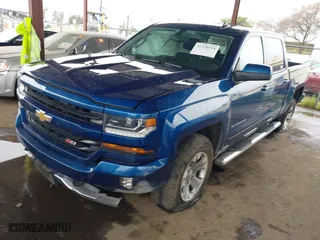 2016 Chevrolet Silverado 1500 LT with VIN 3GCUKREC6GG266485, listed as a IAAI auction lot 41720514 with 105,464 mi miles. Bid and sale history available at carsss.com. Image 2.