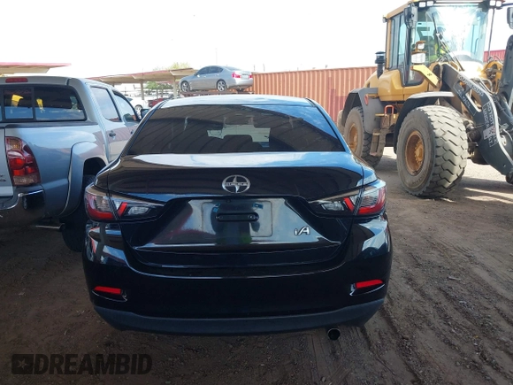 2016 Scion iA z VIN 3MYDLBZV2GY102744, wystawiony jako IAAI lot #42118048 z przebiegiem 128 772 mil mil oraz . Historia ofert i sprzedaży dostępna na DreamBid. Obrazek 16.