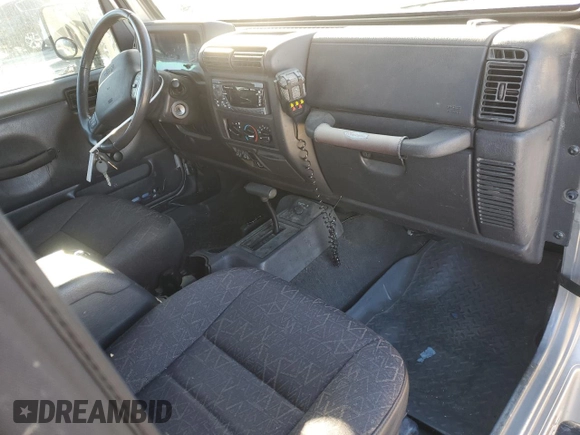 2001 Jeep Wrangler Sport with VIN 1J4FA49S21P346217, listed as a Copart auction lot 46133815 with 103,929 mi miles and Salvage Title. Bid and sale history available at carsss.com. Image 8.