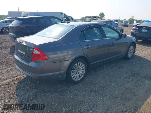 2011 Ford Fusion Hybrid with VIN 3FADP0L34BR253253, listed as a IAAI auction lot 42458290 with 137,110 mi miles and . Bid and sale history available at DreamBid. Image 4.