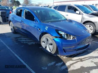 2018 Tesla Model 3 Long Range Battery with VIN 5YJ3E1EA4JF036136, listed as a IAAI auction lot 41711546 with 26,860 mi miles. Bid and sale history available at carsss.com. Image 1.