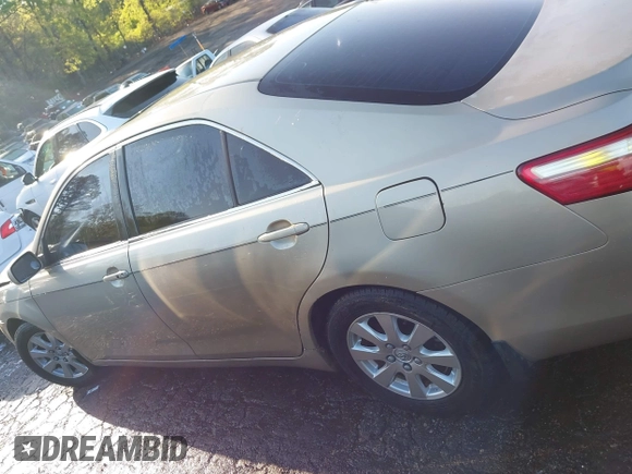 2007 Toyota Camry LE with VIN 4T1BK46K27U010739, listed as a IAAI auction lot 41983608 with 193,763 mi miles and . Bid and sale history available at DreamBid. Image 14.
