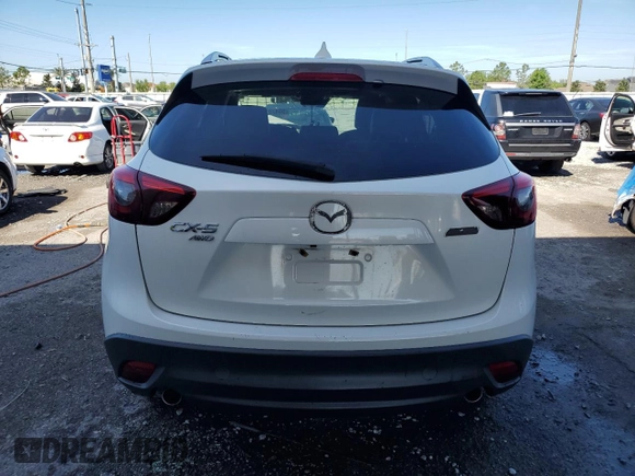 2016 Mazda CX-5 Grand Touring with VIN JM3KE4DY4G0669259, listed as a Copart auction lot 50470145 with 0 mi miles and Non Repairable. Bid and sale history available at carsss.com. Image 6.
