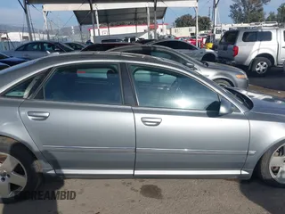2006 Audi A8 4.2L z VIN WAULL44E16N024172, wystawiony jako IAAI lot #41773511 z przebiegiem 136 917 mil mil oraz . Historia ofert i sprzedaży dostępna na DreamBid. Obrazek 13.