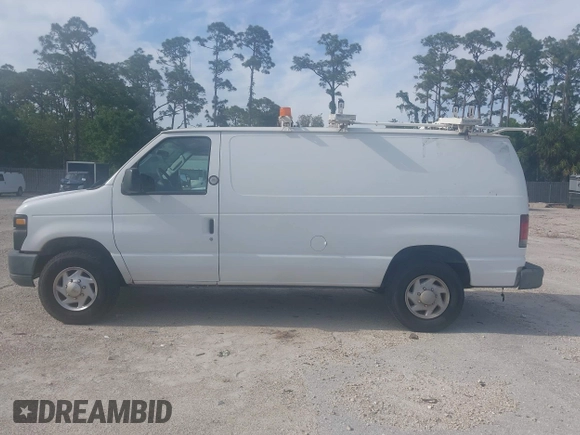 2012 Ford Econoline Cargo Commercial with VIN 1FTNE2EL2CDB10454, listed as a IAAI auction lot 41992574 with 210,118 mi miles and . Bid and sale history available at DreamBid. Image 14.
