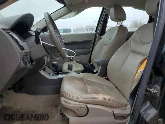 2009 Ford Focus SEL with VIN 1FAHP37N69W219904, listed as a Copart auction lot 47137565 with 131,296 mi miles and Salvage Title. Bid and sale history available at carsss.com. Image 7.