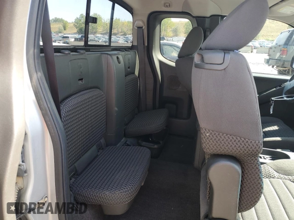2012 Nissan Frontier SV z VIN 1N6AD0CW0CC458551, wystawiony jako Copart lot #73687094 z przebiegiem 129 461 mil mil oraz Szkoda całkowita • Salvage title. Historia ofert i sprzedaży dostępna na DreamBid. Obrazek 10.