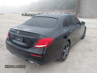 2018 Mercedes-Benz E with VIN WDDZF4KB7JA343160, listed as a IAAI auction lot 40470996 with 56,274 mi miles. Bid and sale history available at carsss.com. Image 4.