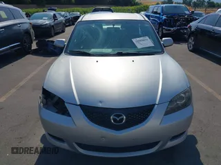 2006 Mazda Mazda3 i with VIN JM1BK12G861534885, listed as a IAAI auction lot 39860656 with 203,722 mi miles. Bid and sale history available at carsss.com. Image 13.