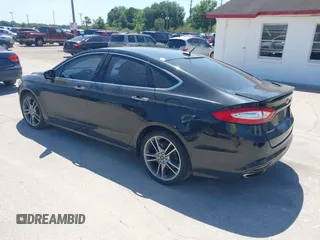 2014 Ford Fusion Titanium with VIN 3FA6P0K9XER216551, listed as a IAAI auction lot 42037004 with 113,857 mi miles and . Bid and sale history available at DreamBid. Image 3.
