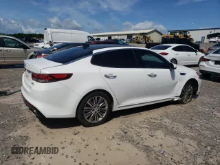 2016 Kia Optima SXL Turbo z VIN 5XXGV4L20GG121446, wystawiony jako Copart lot #57895125 z przebiegiem 131 889 mil mil oraz Czysty tytuł • Clean title. Historia ofert i sprzedaży dostępna na DreamBid. Obrazek 3.