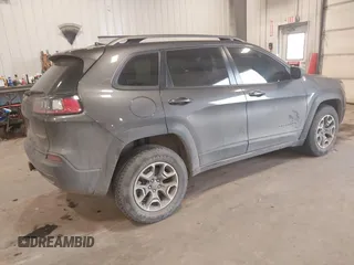 2020 Jeep Cherokee Trailhawk z VIN 1C4PJMBX8LD627104, wystawiony jako IAAI lot #41493732 z przebiegiem 46 463 mil mil oraz . Historia ofert i sprzedaży dostępna na DreamBid. Obrazek 4.