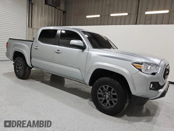 2022 Toyota Tacoma SR5 z VIN 3TMAZ5CN8NM183375, wystawiony jako Copart lot #57228025 z przebiegiem 81 738 mil mil oraz Czysty tytuł • Clean title. Historia ofert i sprzedaży dostępna na DreamBid. Obrazek 4.