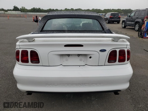 1996 Ford Mustang GT with VIN 1FALP45X9TF225224, listed as a Copart auction lot 66895564 with 113,282 mi miles and Salvage Title. Bid and sale history available at carsss.com. Image 6.