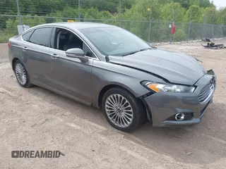 2014 Ford Fusion Titanium с VIN 3FA6P0K97ER277095, выставлен на аукционе IAAI как лот 42293177 с пробегом 215 034 миль миль и . История ставок и продаж доступна на DreamBid. Изображение 1.