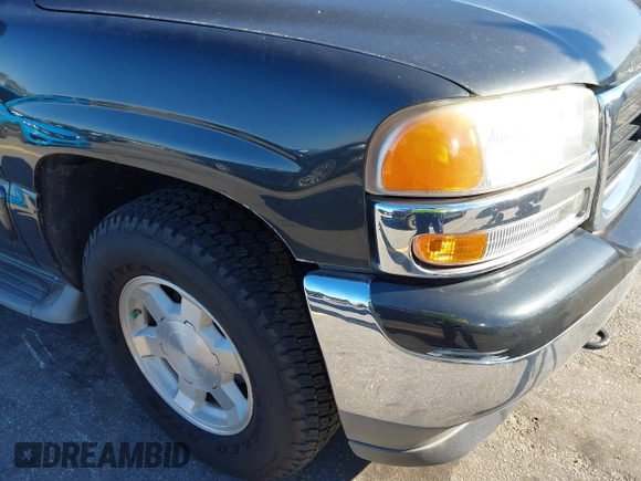 2005 GMC Yukon XL SLT with VIN 3GKFK16Z65G211002, listed as a IAAI auction lot 41667414 with 264,063 mi miles. Bid and sale history available at carsss.com. Image 6.