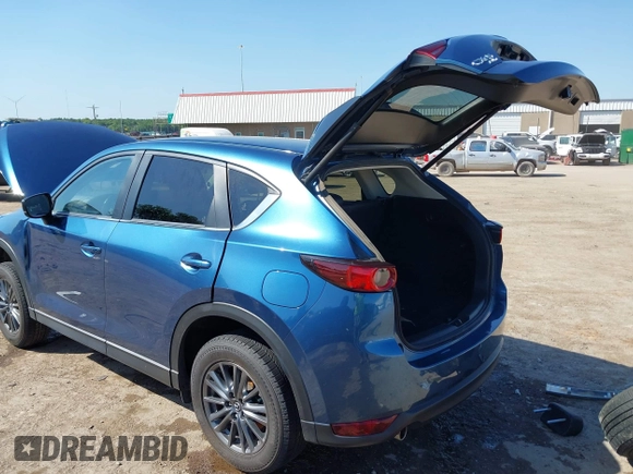 2020 Mazda CX-5 Touring z VIN JM3KFBCM2L0848233, wystawiony jako IAAI lot #42189719 z przebiegiem 80 893 mil mil oraz . Historia ofert i sprzedaży dostępna na DreamBid. Obrazek 3.