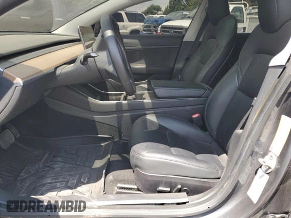2020 Tesla Model 3 Standard Range Plus with VIN 5YJ3E1EA6LF614045, listed as a Copart auction lot 65222584 with 59,823 mi miles and Salvage Title. Bid and sale history available at DreamBid. Image 7.