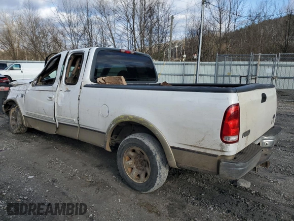 1999 Ford F-250 with VIN 1FTRX27L9XKA27324, listed as a Copart auction lot 87019484 with 152,787 mi miles and Salvage title. Bid and sale history available at DreamBid. Image 2.