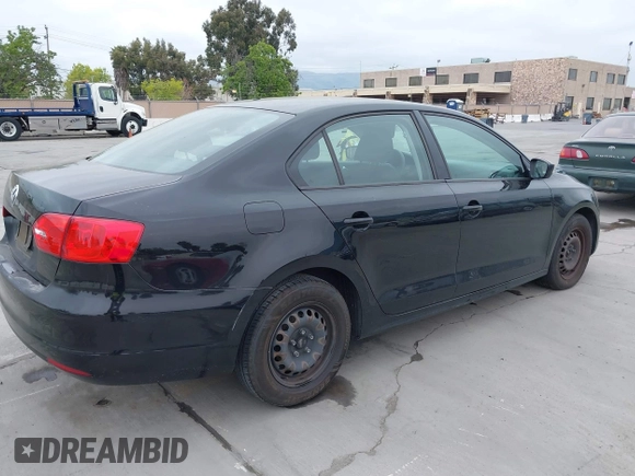 2013 Volkswagen Jetta Sedan S with VIN 3VW2K7AJ8DM237564, listed as a IAAI auction lot 42104259 with 145,375 mi miles. Bid and sale history available at carsss.com. Image 4.