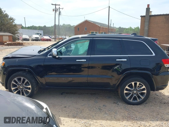 2017 Jeep Grand Cherokee Overland z VIN 1C4RJFCG4HC662884, wystawiony jako IAAI lot #42172826 z przebiegiem 79 305 mil mil oraz . Historia ofert i sprzedaży dostępna na DreamBid. Obrazek 14.