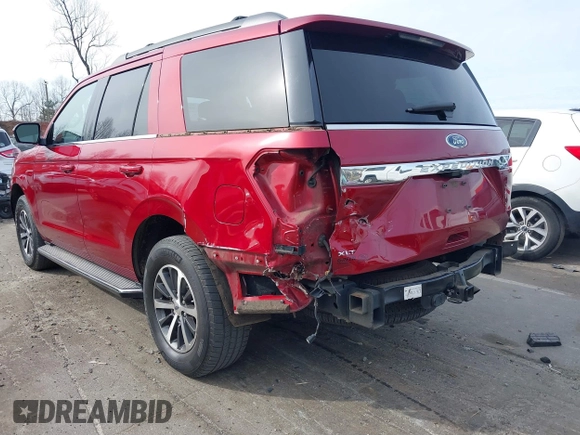 2018 Ford Expedition XLT with VIN 1FMJU1HT6JEA71703, listed as a IAAI auction lot 41606903 with 87,151 mi miles. Bid and sale history available at carsss.com. Image 6.