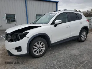 2016 Mazda CX-5 Touring z VIN JM3KE4CY2G0880056, wystawiony jako Copart lot #54978935 z przebiegiem 118 910 mil mil oraz Szkoda całkowita • Salvage title. Historia ofert i sprzedaży dostępna na DreamBid. Obrazek 1.