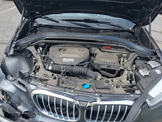 2019 BMW X1 xDrive28i with VIN WBXHT3C51K5L90571, listed as a IAAI auction lot 41909209 with 35,902 mi miles. Bid and sale history available at carsss.com. Image 10.