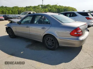 2003 Mercedes-Benz E-Class 3.2L with VIN WDBUF65J13A234665, listed as a Copart auction lot 51797834 with 300,159 mi miles and Salvage Title. Bid and sale history available at carsss.com. Image 2.