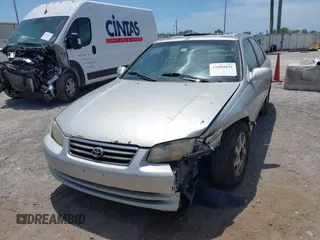 2000 Toyota Camry LE z VIN 4T1BF22K9YU102852, wystawiony jako IAAI lot #42084031 z przebiegiem 253 595 mil mil oraz . Historia ofert i sprzedaży dostępna na DreamBid. Obrazek 6.
