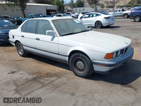 1994 BMW 7 Series z VIN WBAGD4324RDE65491, wystawiony jako IAAI lot #42761773 z przebiegiem 141 762 mil mil oraz . Historia ofert i sprzedaży dostępna na DreamBid. Obrazek 1.