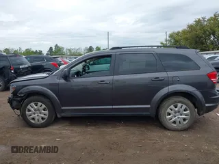 2020 Dodge Journey SE Value z VIN 3C4PDCAB2LT202088, wystawiony jako IAAI lot #41894515 z przebiegiem 97 564 mil mil oraz . Historia ofert i sprzedaży dostępna na DreamBid. Obrazek 14.