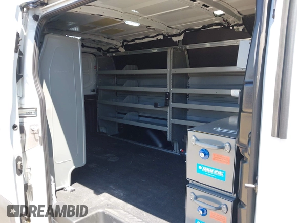 2023 Ford Transit Cargo z VIN 1FTYE1Y81PKB53926, wystawiony jako IAAI lot #42514906 z przebiegiem 52 410 mil mil oraz . Historia ofert i sprzedaży dostępna na DreamBid. Obrazek 8.