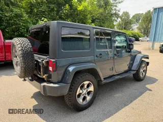 2016 Jeep Wrangler Unlimited Sahara with VIN 1C4BJWEG9GL169490, listed as a Copart auction lot 61507025 with 198,602 mi miles and Clean title. Bid and sale history available at DreamBid. Image 4.