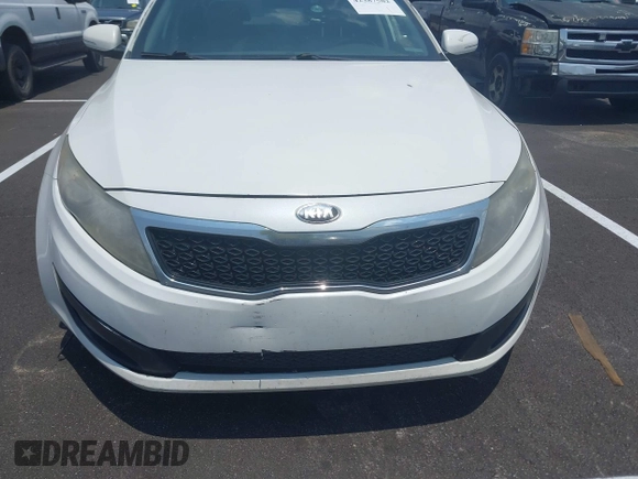 2013 Kia Optima EX z VIN 5XXGN4A70DG121117, wystawiony jako IAAI lot #42387582 z przebiegiem 314 327 mil mil oraz . Historia ofert i sprzedaży dostępna na DreamBid. Obrazek 6.