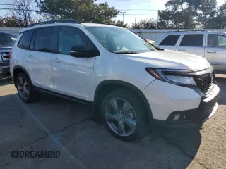 2021 Honda Passport Touring with VIN 5FNYF8H91MB027654, listed as a Copart auction lot 87270244 with 10,481 mi miles and Salvage Title. Bid and sale history available at carsss.com. Image 4.