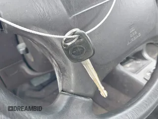 1994 Toyota Camry LE z VIN 4T1SK12E0RU463582, wystawiony jako IAAI lot #41823733 z przebiegiem 120 050 mil mil oraz . Historia ofert i sprzedaży dostępna na DreamBid. Obrazek 11.