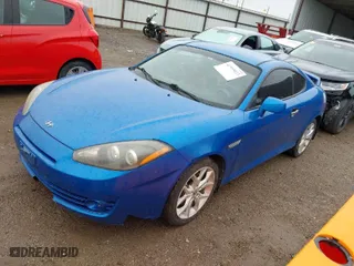 2008 Hyundai Tiburon GT with VIN KMHHN66FX8U282926, listed as a IAAI auction lot 41959023 with 119,414 mi miles. Bid and sale history available at carsss.com. Image 15.