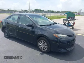 2018 Toyota Corolla L with VIN 5YFBURHE1JP793513, listed as a IAAI auction lot 42485540 with 100,343 mi miles and . Bid and sale history available at DreamBid. Image 1.