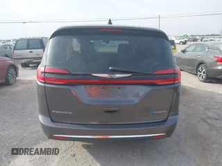 2023 Chrysler Pacifica Hybrid Touring L z VIN 2C4RC1L73PR598923, wystawiony jako IAAI lot #42124867 z przebiegiem 51 173 mil mil oraz . Historia ofert i sprzedaży dostępna na DreamBid. Obrazek 16.