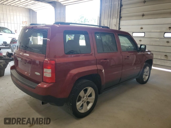 2014 Jeep Patriot Latitude with VIN 1C4NJRFB2ED734624, listed as a Copart auction lot 60675175 with 91,624 mi miles and Salvage title. Bid and sale history available at DreamBid. Image 3.