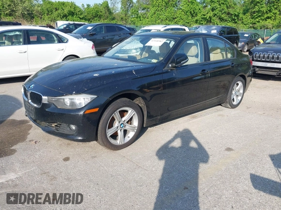 2014 BMW 3 Series 328i xDrive with VIN WBA3B5G56ENS06890, listed as a IAAI auction lot 42168982 with 133,664 mi miles. Bid and sale history available at carsss.com. Image 2.