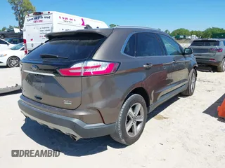 2019 Ford Edge SEL with VIN 2FMPK3J90KBB67205, listed as a IAAI auction lot 41836997 with 86,805 mi miles. Bid and sale history available at carsss.com. Image 4.