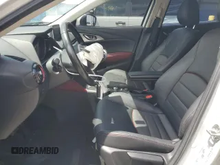 2017 Mazda CX-3 Touring z VIN JM1DKDC78H0150588, wystawiony jako Copart lot #55284205 z przebiegiem 78 923 mil mil oraz Szkoda całkowita • Salvage title. Historia ofert i sprzedaży dostępna na DreamBid. Obrazek 7.