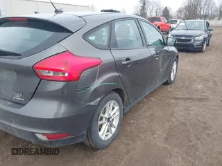 2015 Ford Focus SE with VIN 1FADP3K27FL303111, listed as a IAAI auction lot 41802182 with 195,834 mi miles and . Bid and sale history available at DreamBid. Image 14.