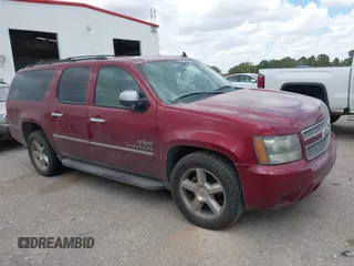 2011 Chevrolet Suburban LT with VIN 1GNSCJE0XBR355603, listed as a IAAI auction lot 42555932 with 240,213 mi miles and . Bid and sale history available at DreamBid. Image 11.