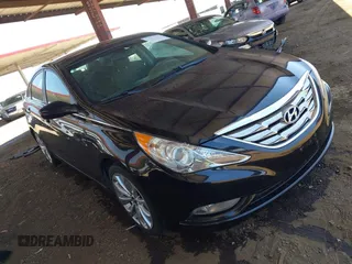 2013 Hyundai Sonata Limited with VIN 5NPEC4AC1DH583863, listed as a IAAI auction lot 42598479 with 157,168 mi miles and . Bid and sale history available at DreamBid. Image 1.